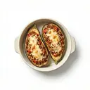 Auberginen gefüllt mit Lammfleisch, Reis und Tomaten, überbacken