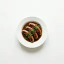 Bratwurst gebraten, in Biersauce