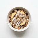 Müeslimischung, Getreideflocken mit Früchten und Nüssen, gezuckert