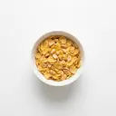 Cornflakes gesüßt, mit Zuckerglasur und Erdnüssen, angereichert mit Vitaminen und Mineralstoffen