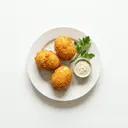 Eier im Ausbackteig gebraten