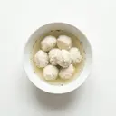 Fischklößchen mit Rotbarsch gegart