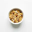 Getreideflakes gesüßt, mit Nüssen