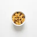 Getreideflakes gesüßt, mit Trockenfrüchten