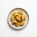 Grießklößchen getrocknet, gekocht, gebraten ohne Fett (Pfanne)