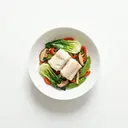 Kabeljau gedünstet auf asiatischem Gemüse