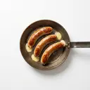 Käsekrainer/Käsewürstchen, gebraten ohne Fett (Pfanne)