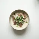 Kalbsherz geschmort, mit Sahnesauce