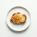 Kalbsschnitzel mit Kochschinken und Käse übergrillt