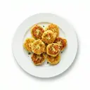 Kartoffelklöße von gekochten Kartoffeln, gebraten mit Eiermilch