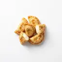 Kartoffeltaschen mit Frischkäsefüllung tiefgefroren, frittiert