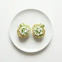 Kohlrabi gekocht, vegetarisch gefüllt mit Frischkäse und Erbsen