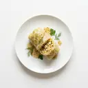 Kohlroulade gedünstet, vegan gefüllt mit Hirse, Tomaten und Tofu