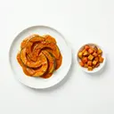 Kürbis gebacken, in Paprikasauce von Bechamelsauce