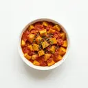 Kürbis gebacken, in Tomatensauce (aus Tomatenmark)