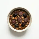 Linsen-Eintopf mit Backpflaumen und Blutwurst