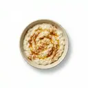 Milchreis gesüßt, mit Milch 3.5 % Fett, gebräunter Butter, Zucker und Zimt