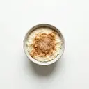 Milchreis gesüßt, mit Milch 3,5 % Fett, Zucker und Zimt