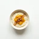 Milchreis mit Milch 3,5 % Fett und Aprikosenkompott