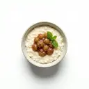 Milchreis mit Milch 3,5 % Fett und Stachelbeerkompott