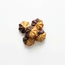 Nuss-Spritzgebäck (Rührmasse) mit Nougatfüllung, schokoliert