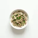 Pilze gedünstet, mit saurer Sahne