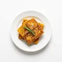 Polenta (Maisgrieß mit Wasser, Fett und Salz) gekocht, gebraten ohne Fett (Pfanne)