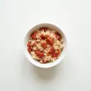 Reis mit gedünsteten Tomaten