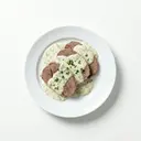 Rinderherz gekocht, mit Kräutersauce von heller/weißer Grundsauce