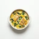 Rotbarschauflauf mit Kartoffeln und Spinat