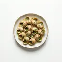 Schnecken im Sud gekocht