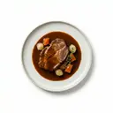 Schweinekamm geschmort, mit Grundsauce dunkel/braun