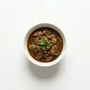 Schweinenierengeschnetzeltes sauer, mit Grundsauce dunkel/braun