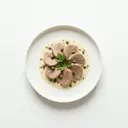 Schweinezunge gekocht, mit Weißweinsauce von heller/weißer Grundsauce