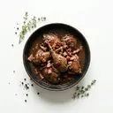 Wildente geschmort, mit Speck und Grundsauce dunkel/braun