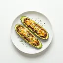 Zucchini mit Hackfleischfüllung und Käse überbacken