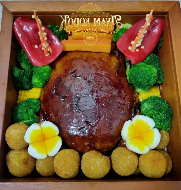 Foto von Indonesisches Ayam Kodok, gestopft & gebraten – fertig angerichtet