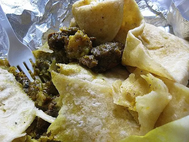 Foto von Barbadisches Cou-Cou mit Flugfisch – fertig angerichtet