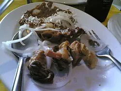 Foto von Authentische mexikanische Tacos de Tripas – fertig angerichtet